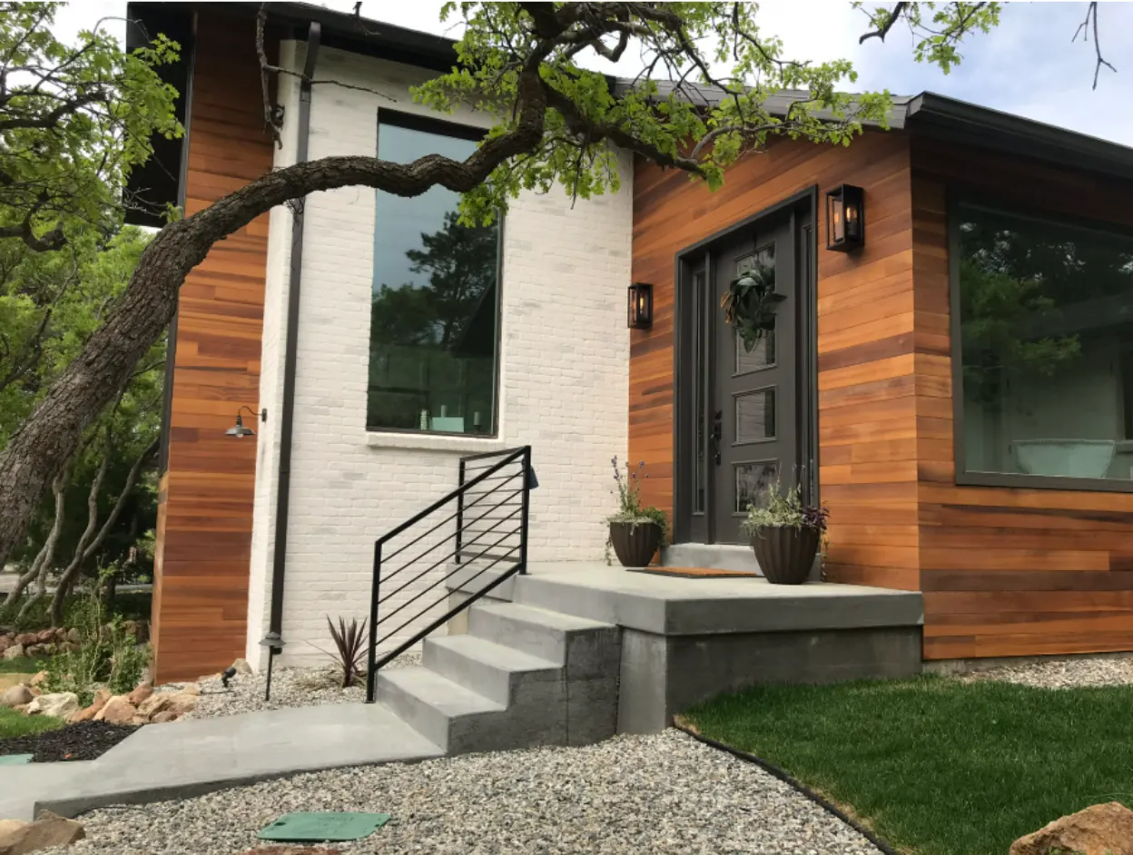 Modern Utah home with cedar siding and white brick — REI Investment Group project